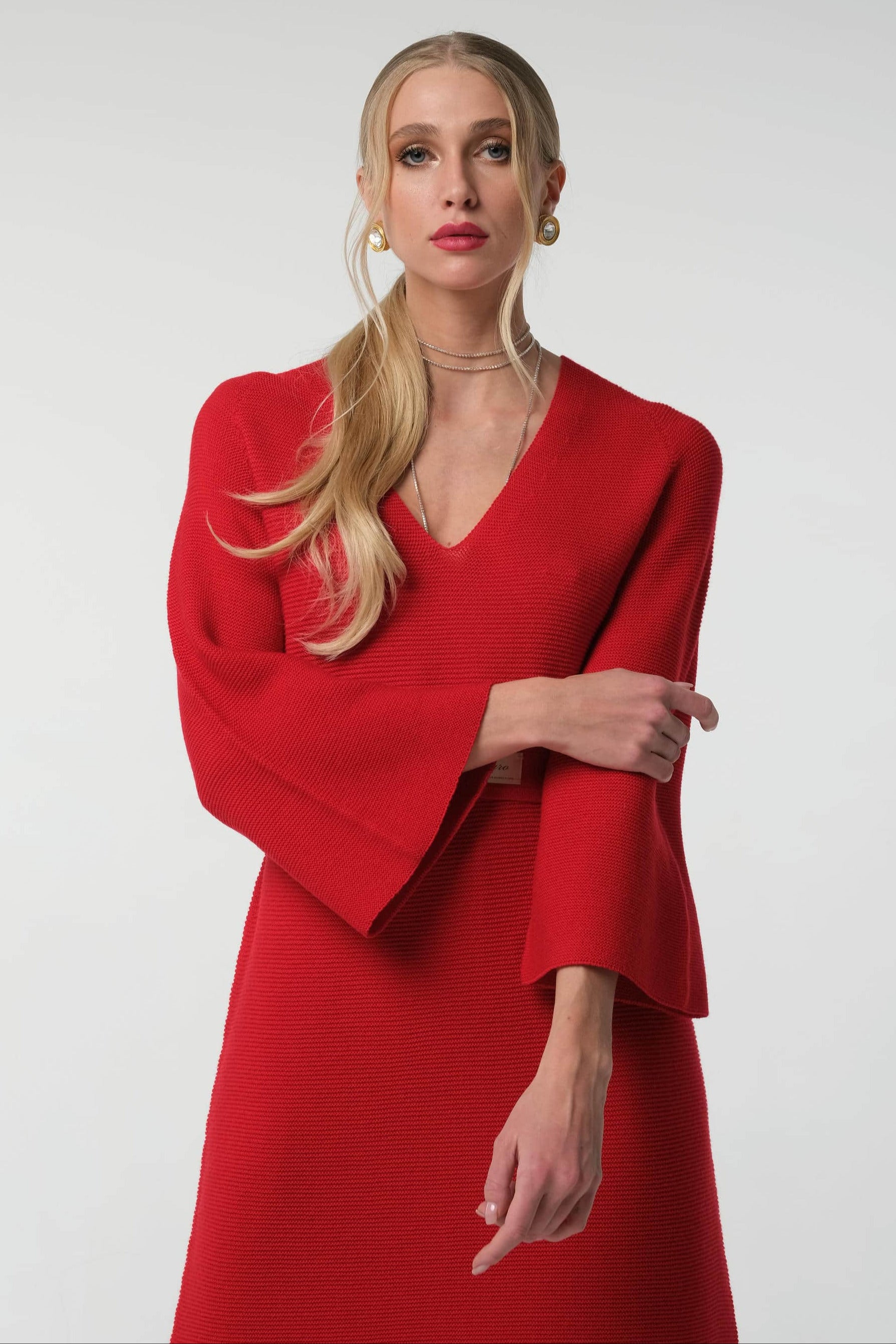 Merino-Strickkleid mit Glockenärmeln