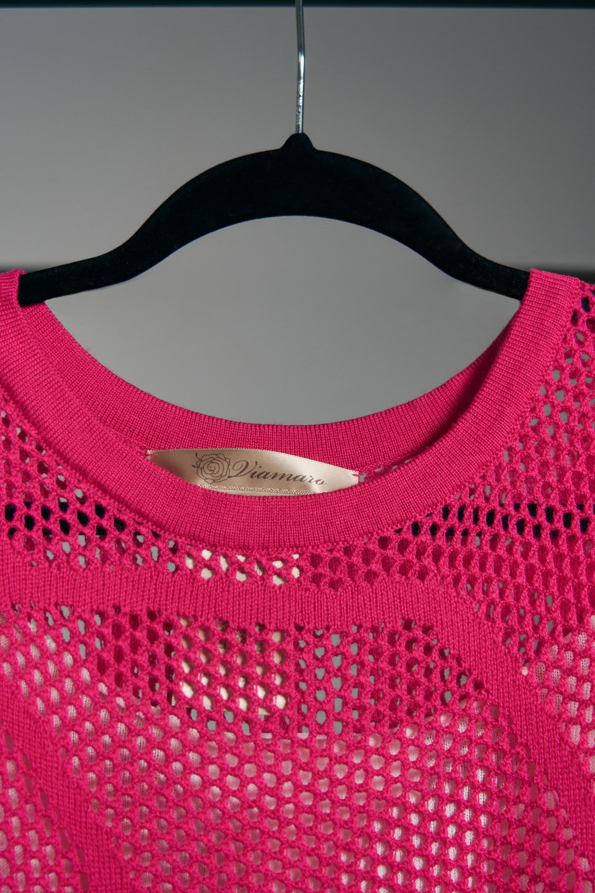 Rosenfarbenes Ajour-Strickoberteil