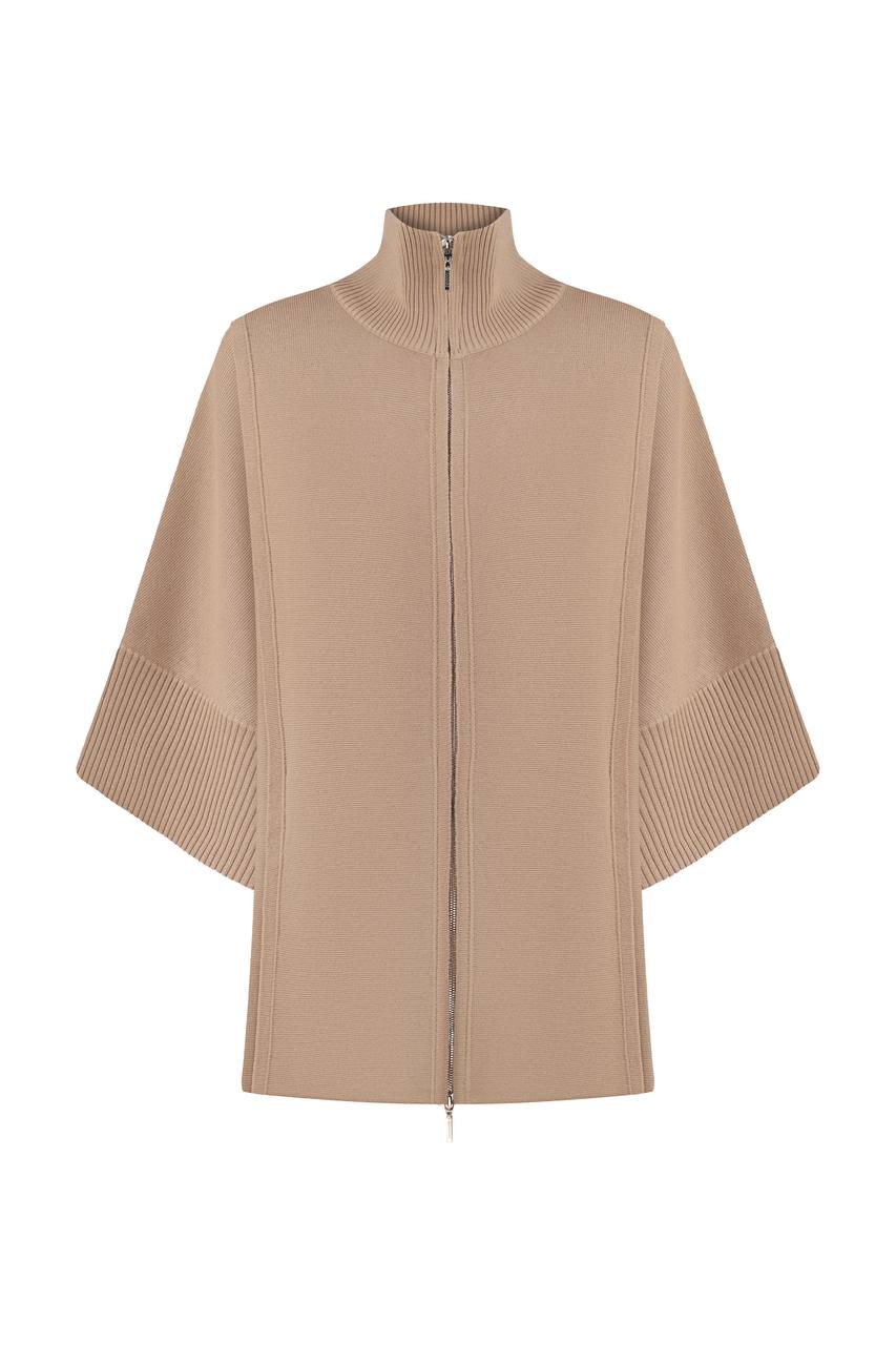 A model wearing a beige double-zip coat with a structured high collar and flowing sleeves, paired with matching cropped culottes. Footwear not shown.