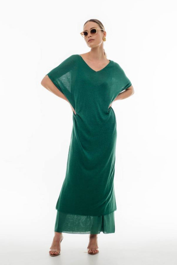 Model wearing the summer sheer tunic dress by Viamaro, styled with layered hem and a relaxed fit