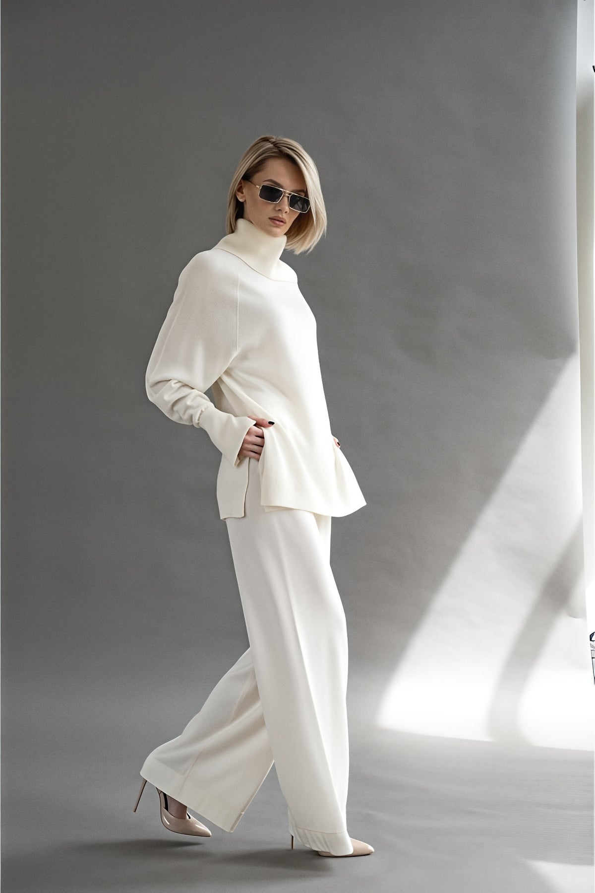 Merino turtleneck and palazzo set in oyster pearl, walking