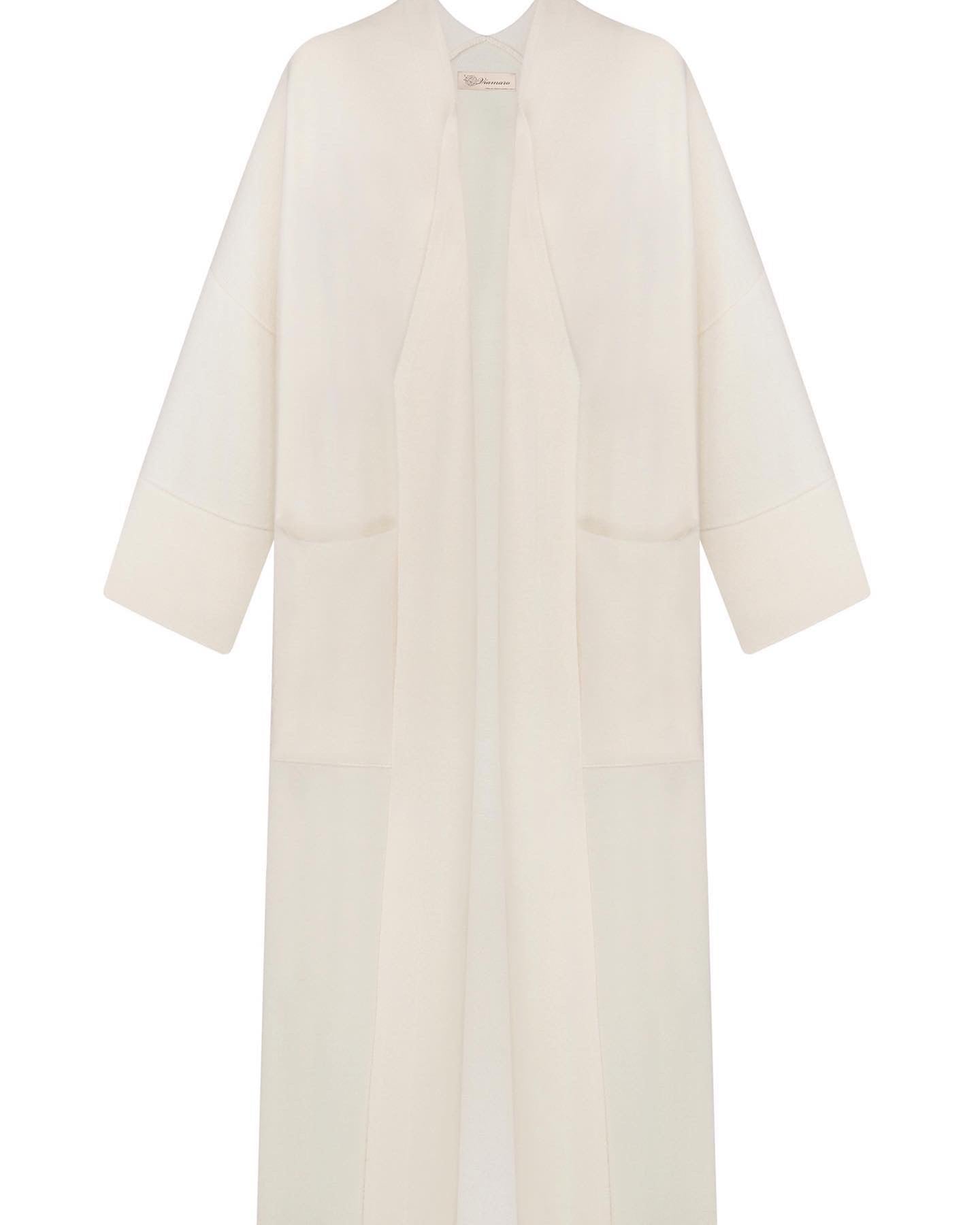 A pink merino wool coat with a belt, designed with wide sleeves and a V-neckline, displayed against a plain background.