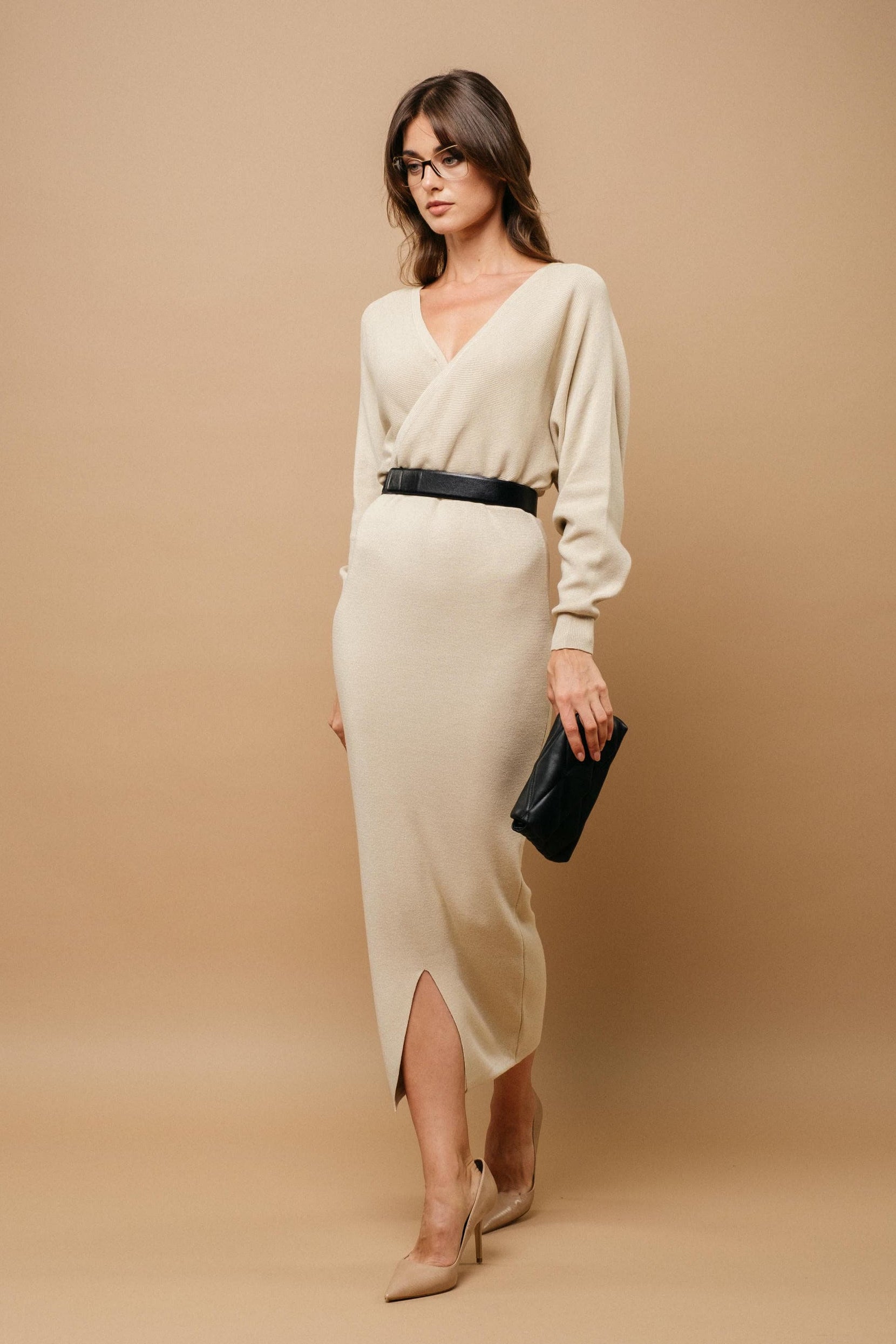 Modal knit sculpt dress with relaxed top, defined waist, and deep V wrap neckline, front view